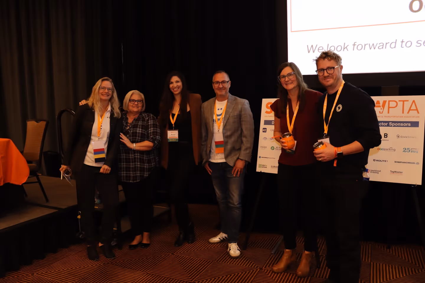 SWPTA members networking during an indoor event