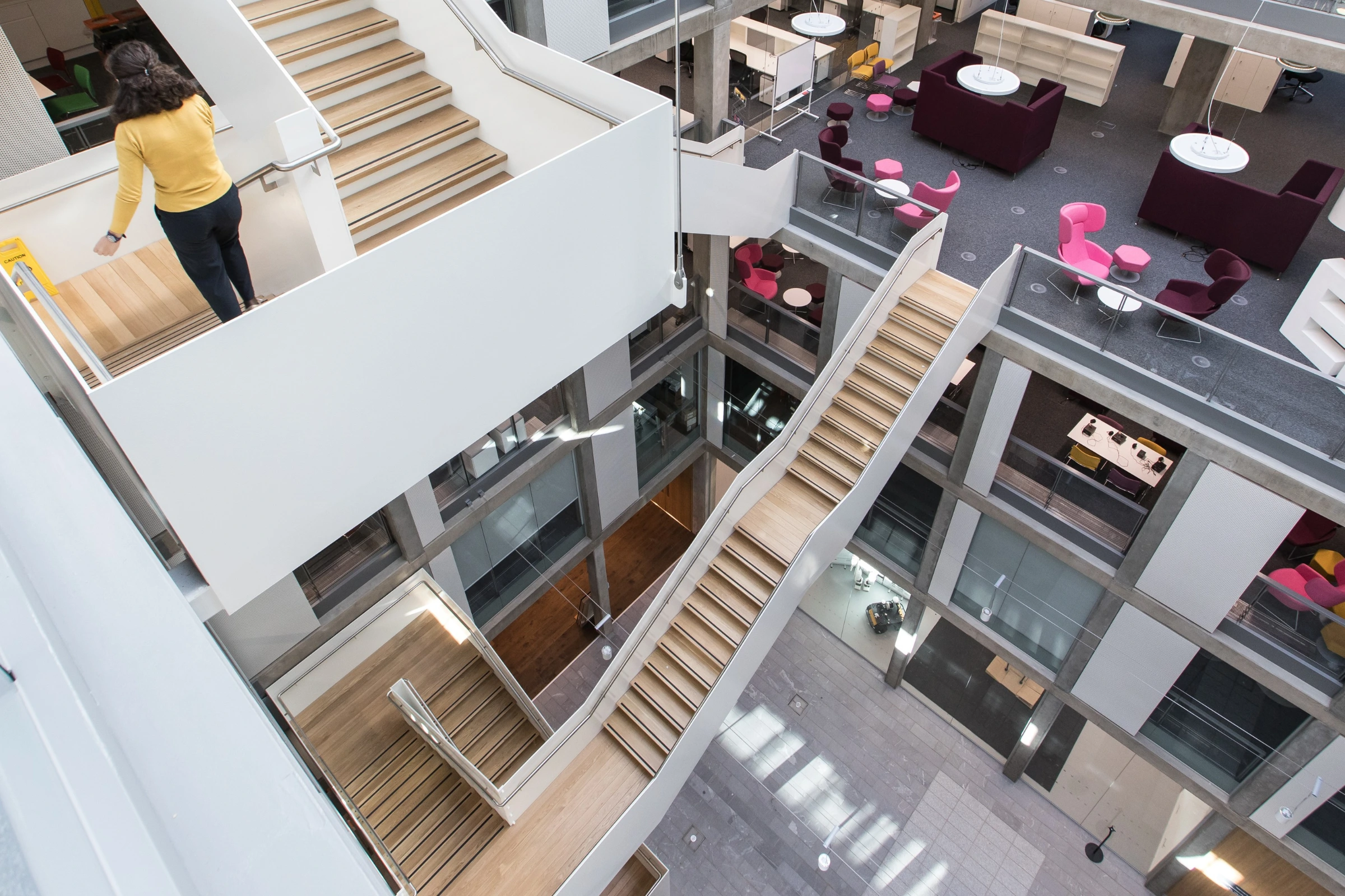 Interior view of Bayes Centre showing multi-level open workspace with modern offices, collaborative areas and meeting spaces