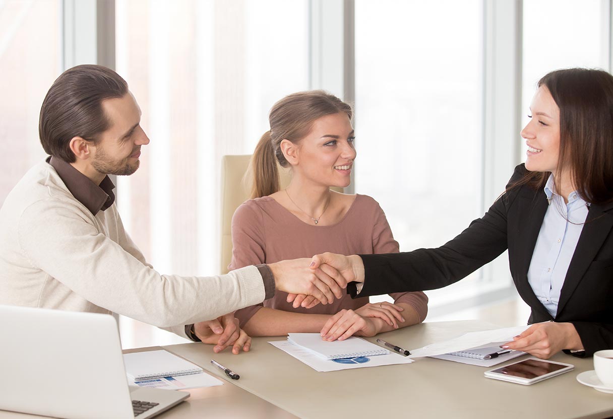 image of diverse team collaboration across a desk for an ai biotech company