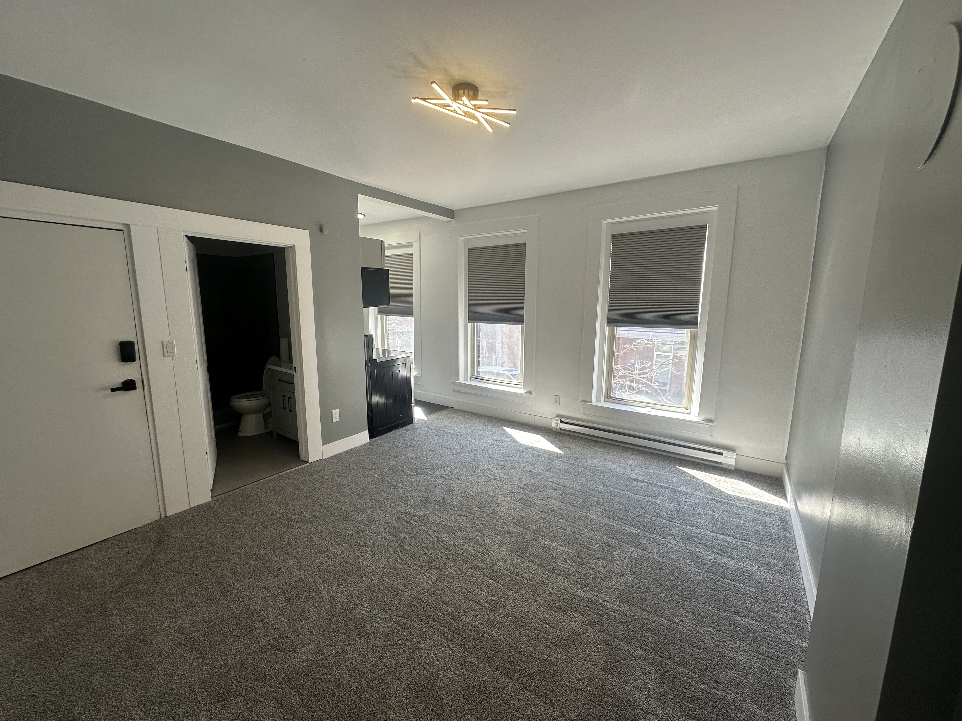 [background image] image of a modern office building for an ai healthcare company