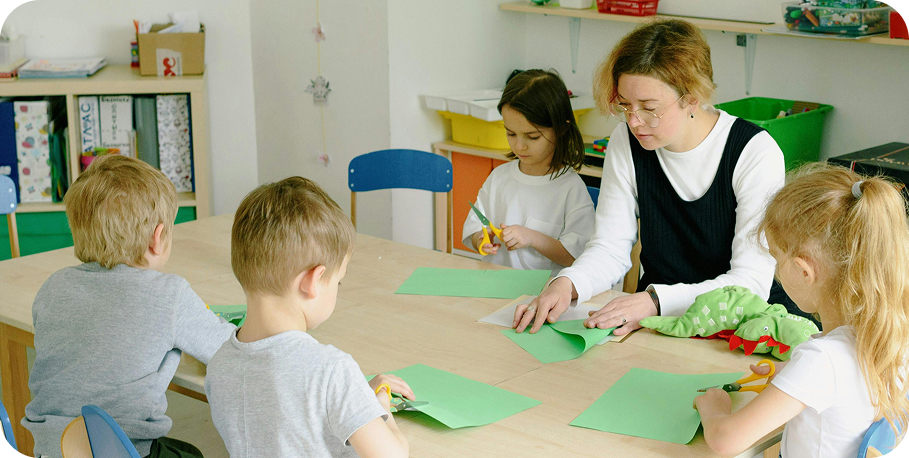 teacher in classroom teaching students