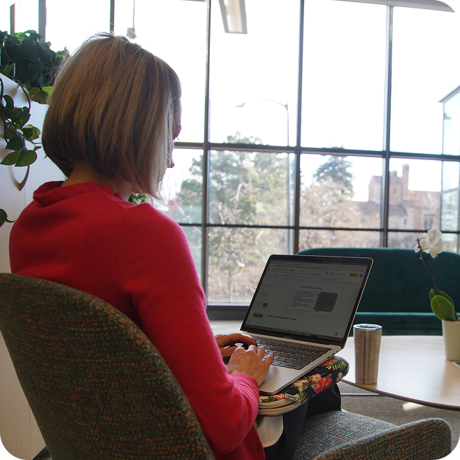 woman typing on computer