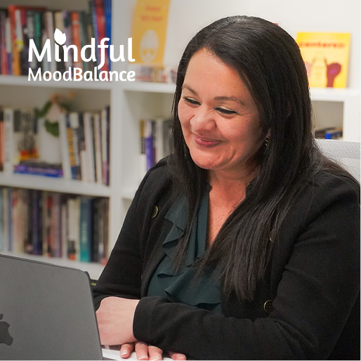 woman smiling at computer