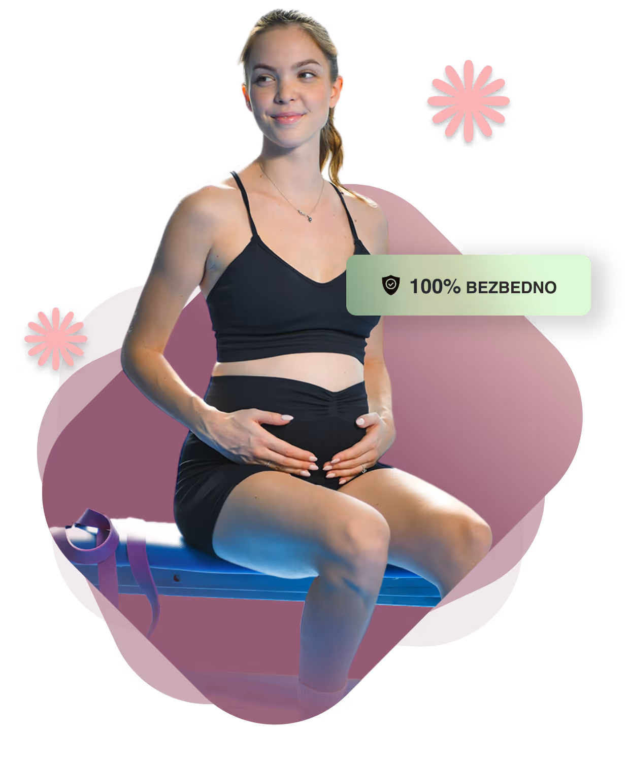 Trudnica koja sedi na fitnes lopti