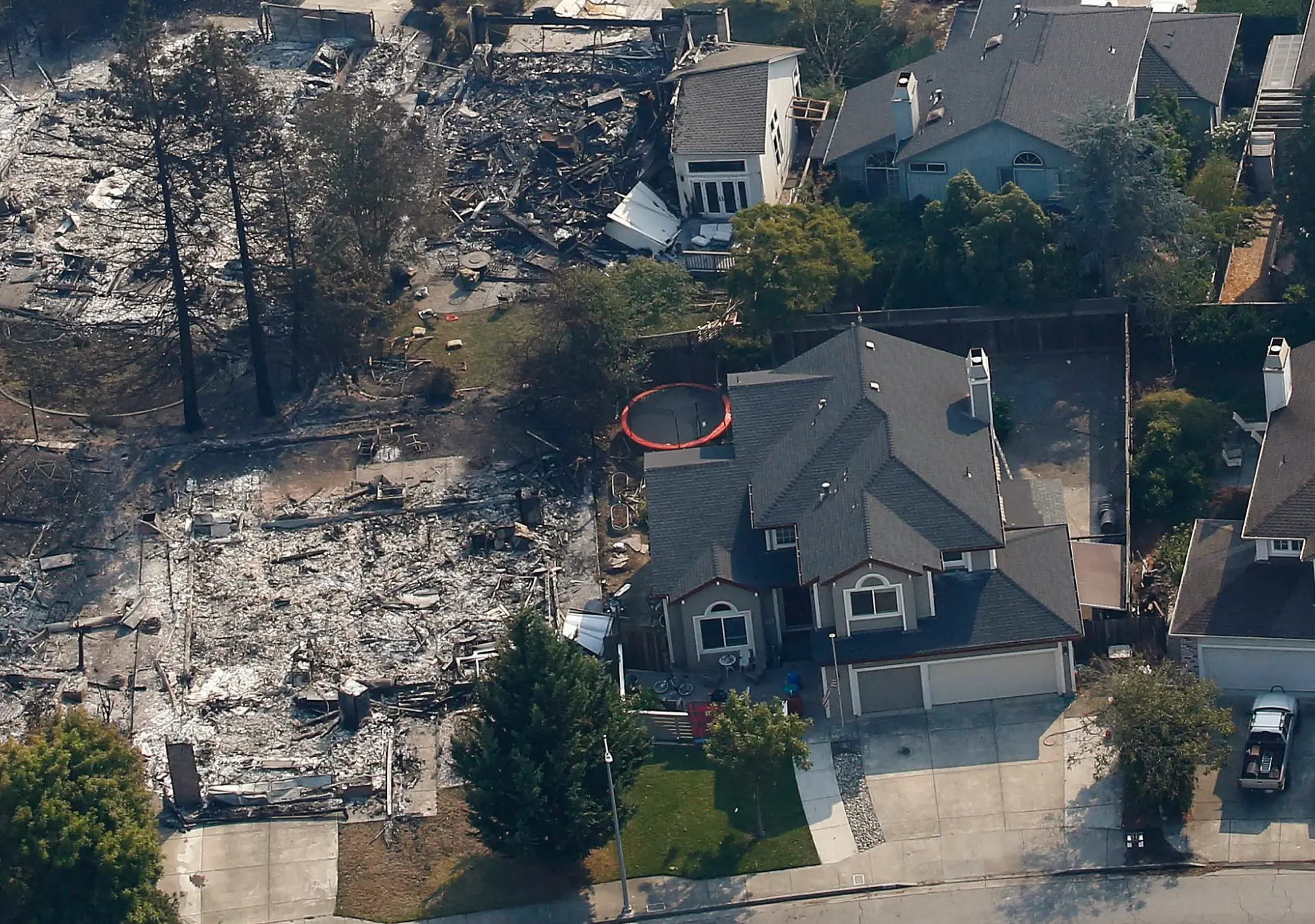 An aerial view of a house that has been destroyed.