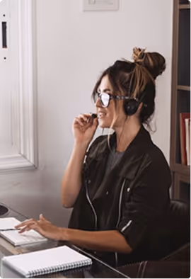 Support person talking to someone using her headphone