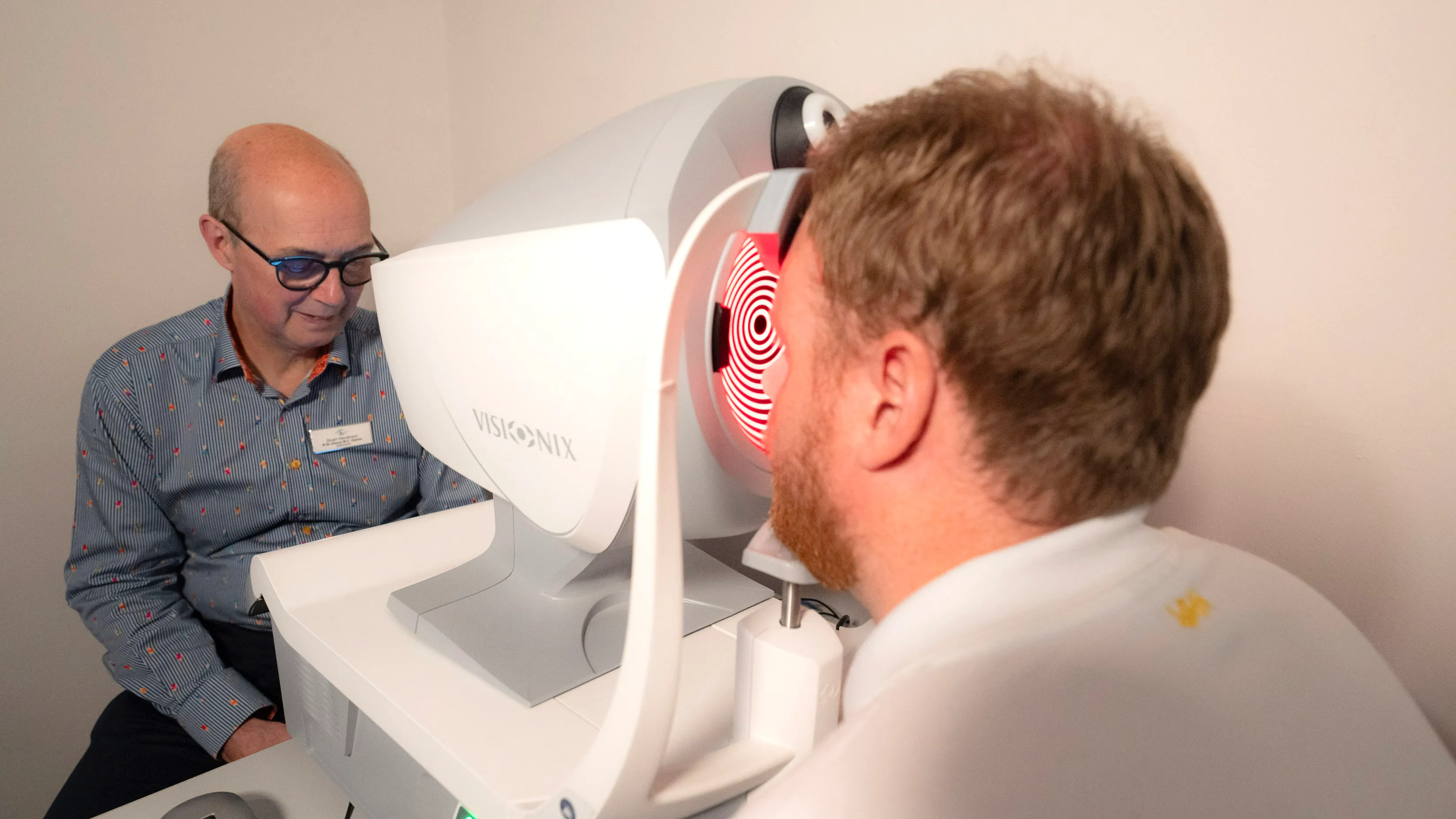 Eye examination using Visonix medical imaging device with red light