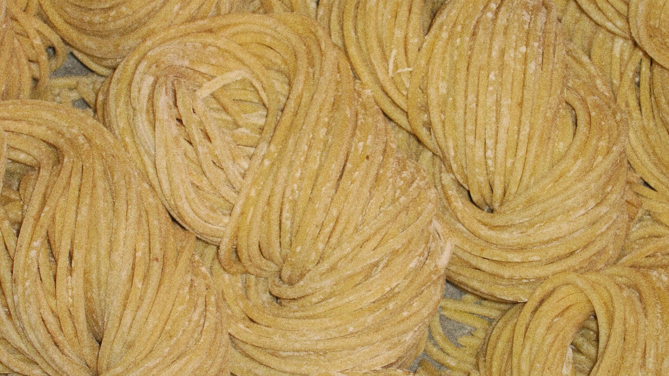 Coils of fresh Slurp ramen noodles dusted with flour