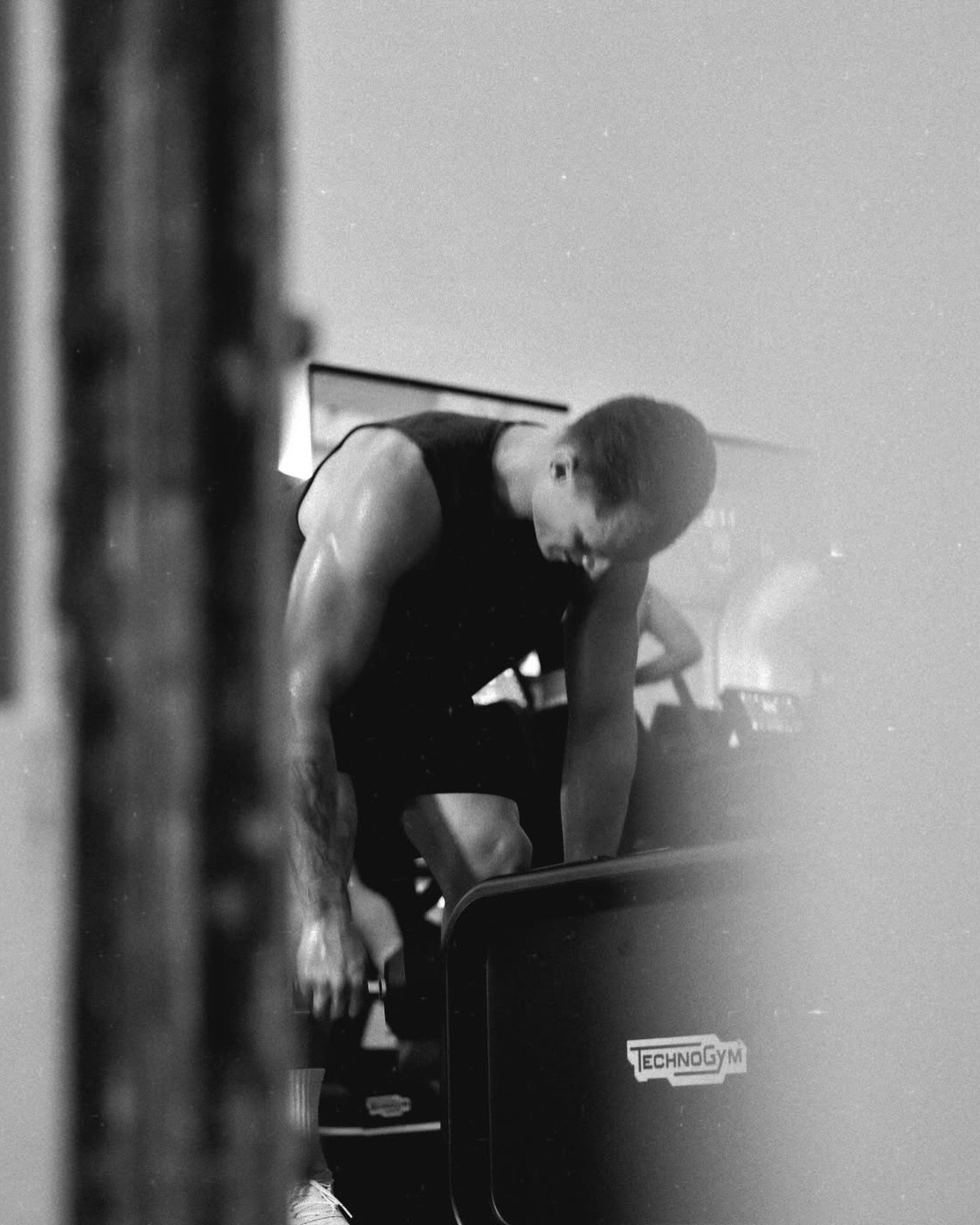 Members working on treadmills and weights