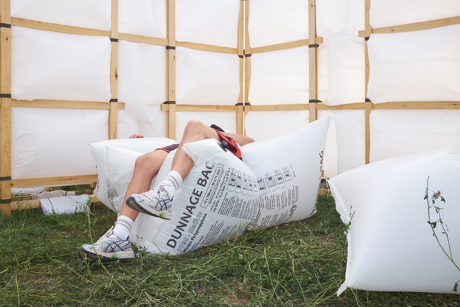 Air Pavilion by Joanne Jacobsen, Magnus Krautwald, Timothy Martin & Viggo Garfiel in use by one of the festival guests.