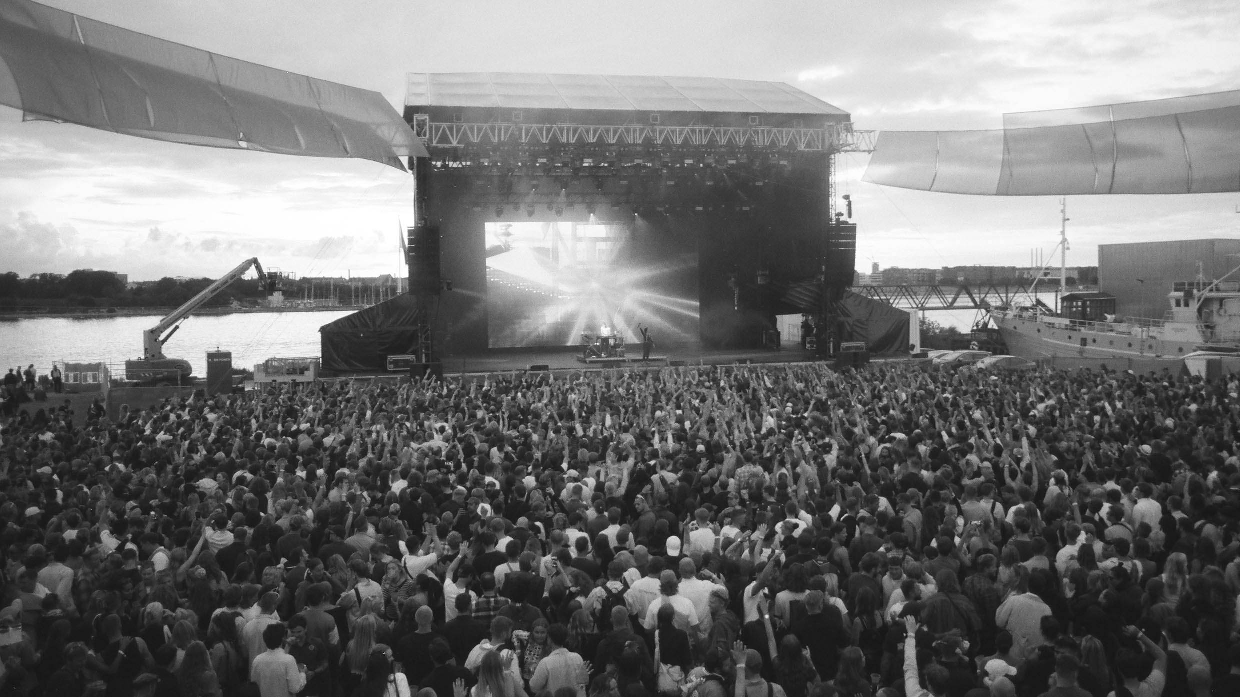 Back view of the main stage at O Days while Romy is performing.