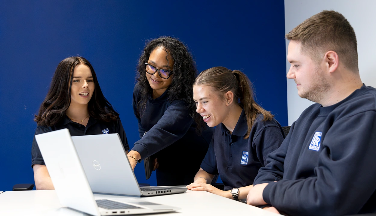 Colleagues working together at a computer