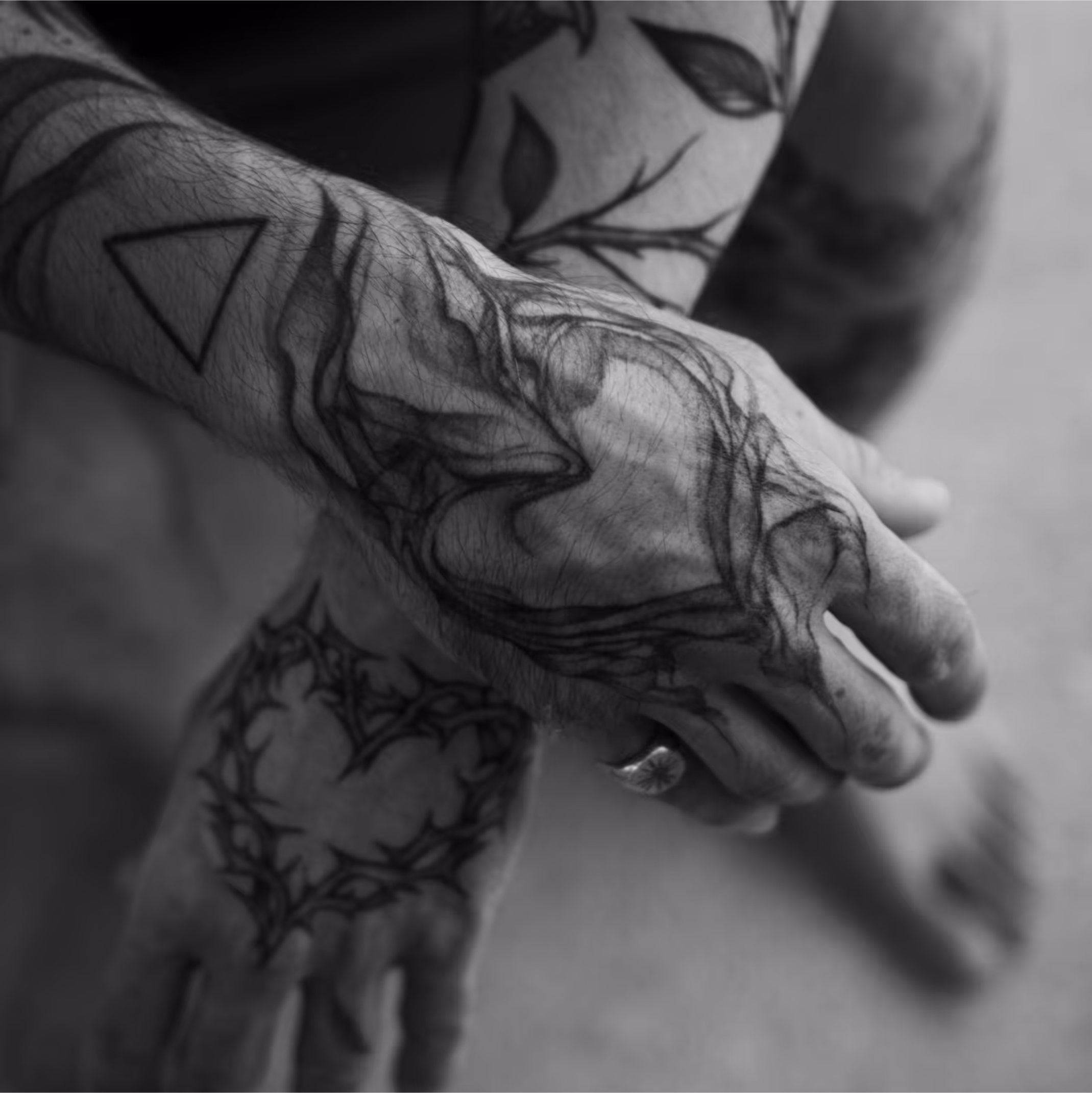 heart-shaped tattoos on hands