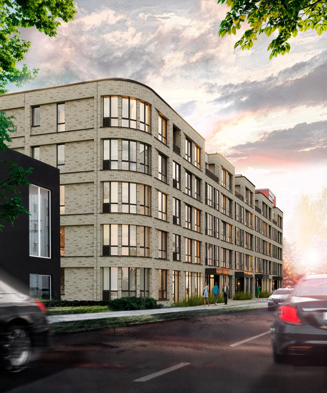 Modern multi-story residential building with large windows along a street at sunset, with people walking on the sidewalk and cars on the road.