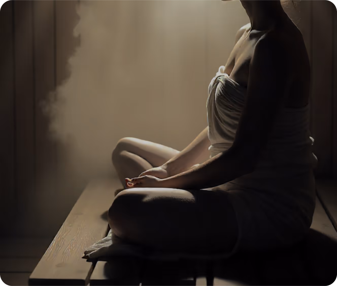 Person seated in meditation posture with steam, representing the Breathwork Sauna at the Toronto Sauna Festival