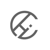 Abstract circular logo with intersecting angular lines inside.