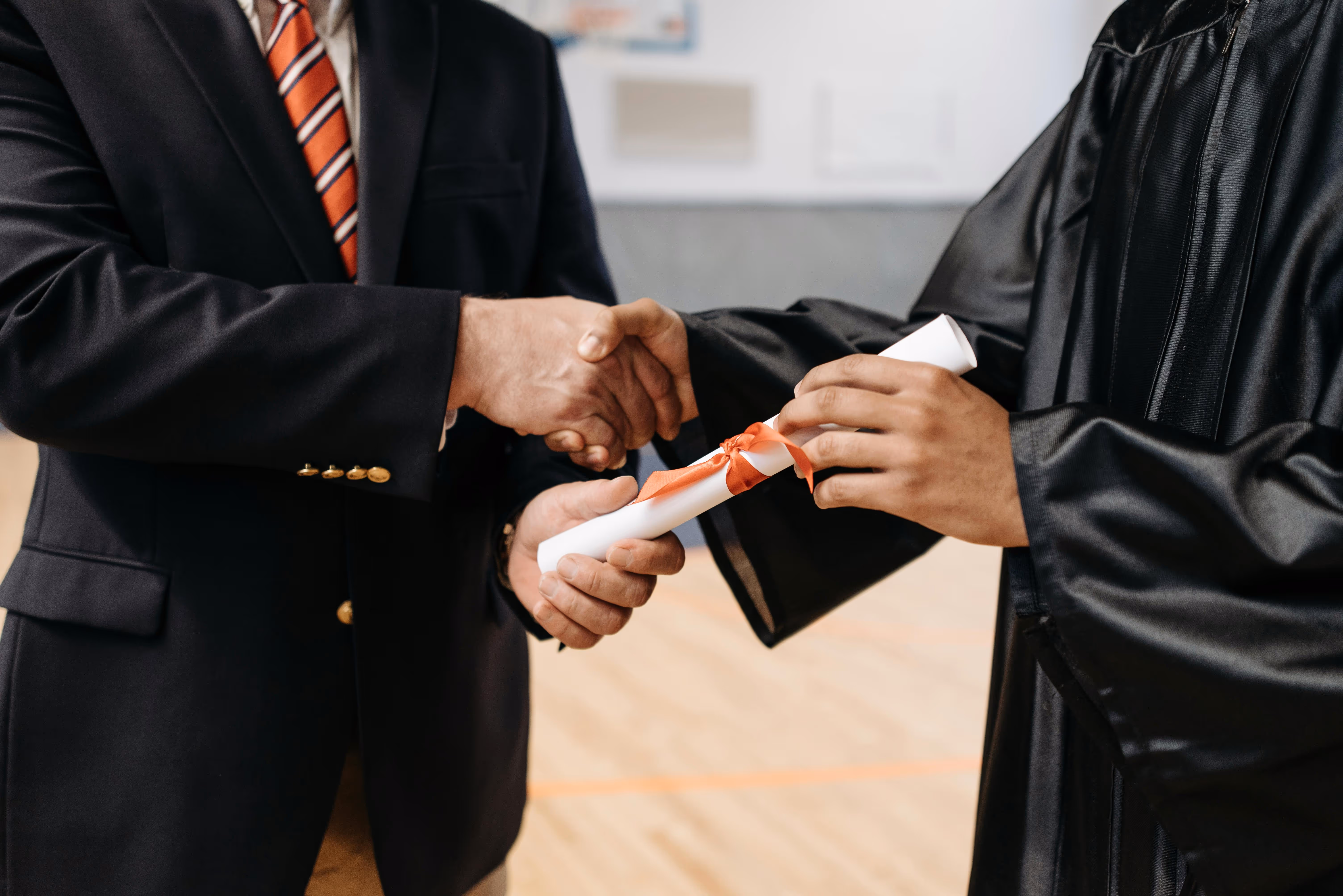 image of a student receiving their diploma