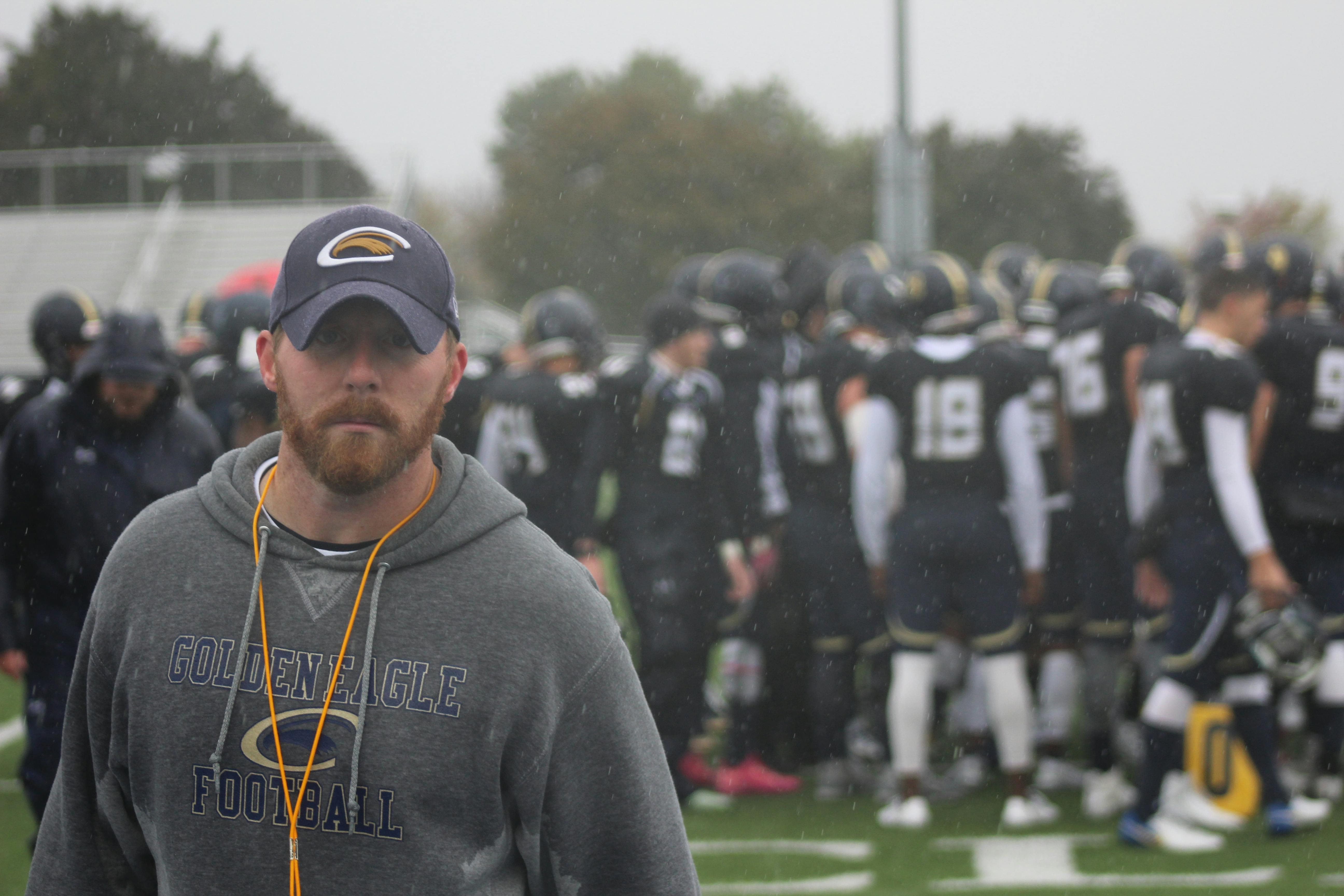 image of a coach and team members