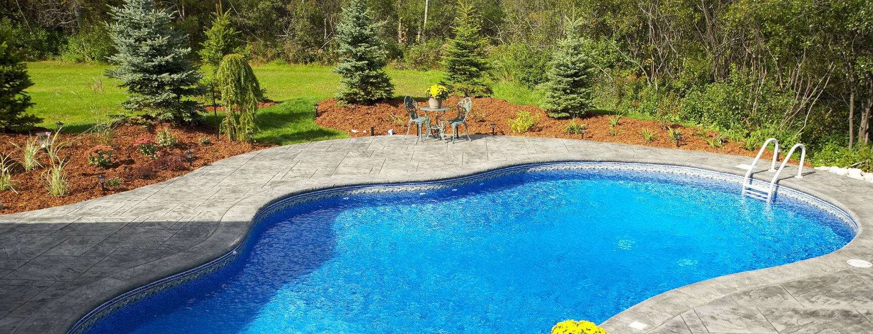 Image of a crystal clear well maintained by a professional pool company