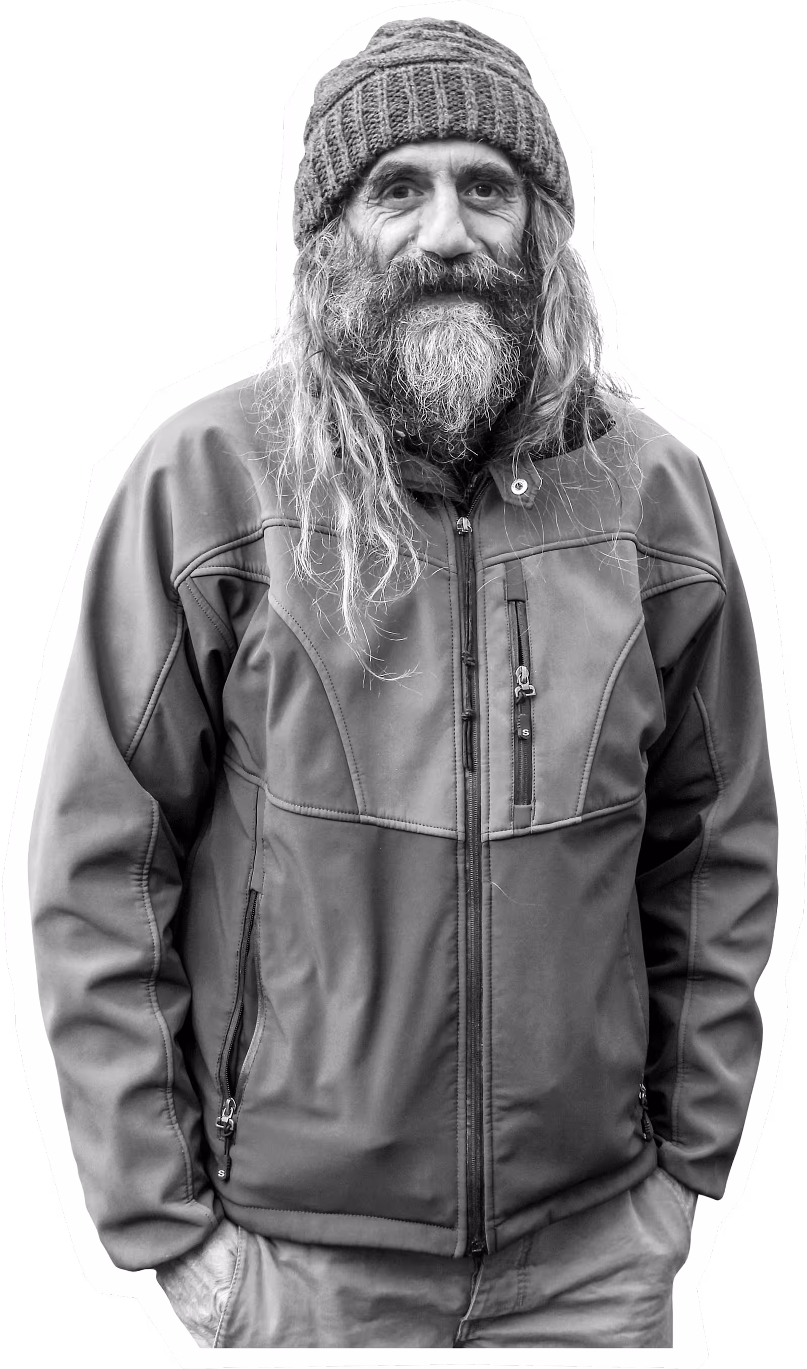 Elderly man with long beard and knit hat wearing winter jacket