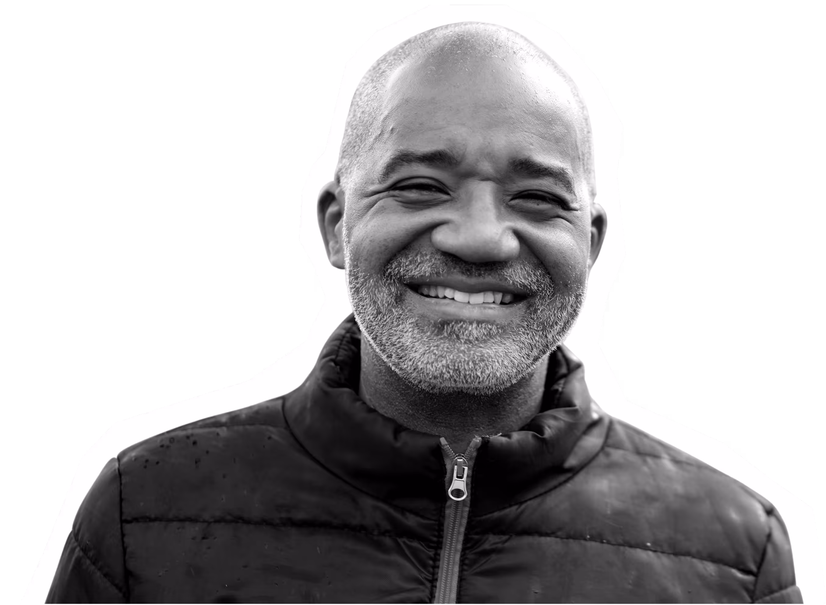 Smiling middle-aged man in black jacket, black and white portrait