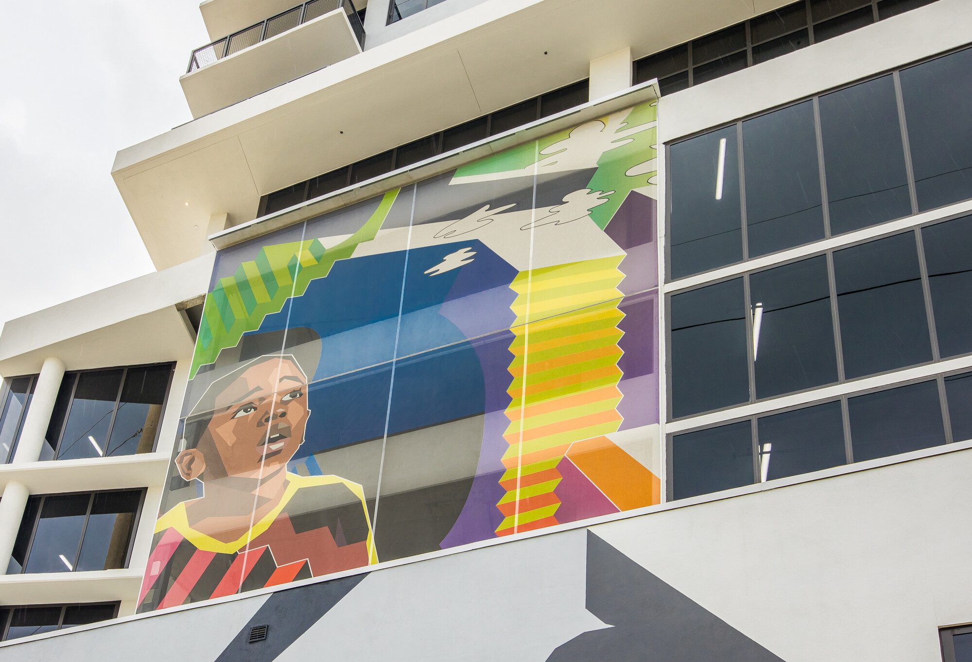 A smaller facade that features iconography of a young child.