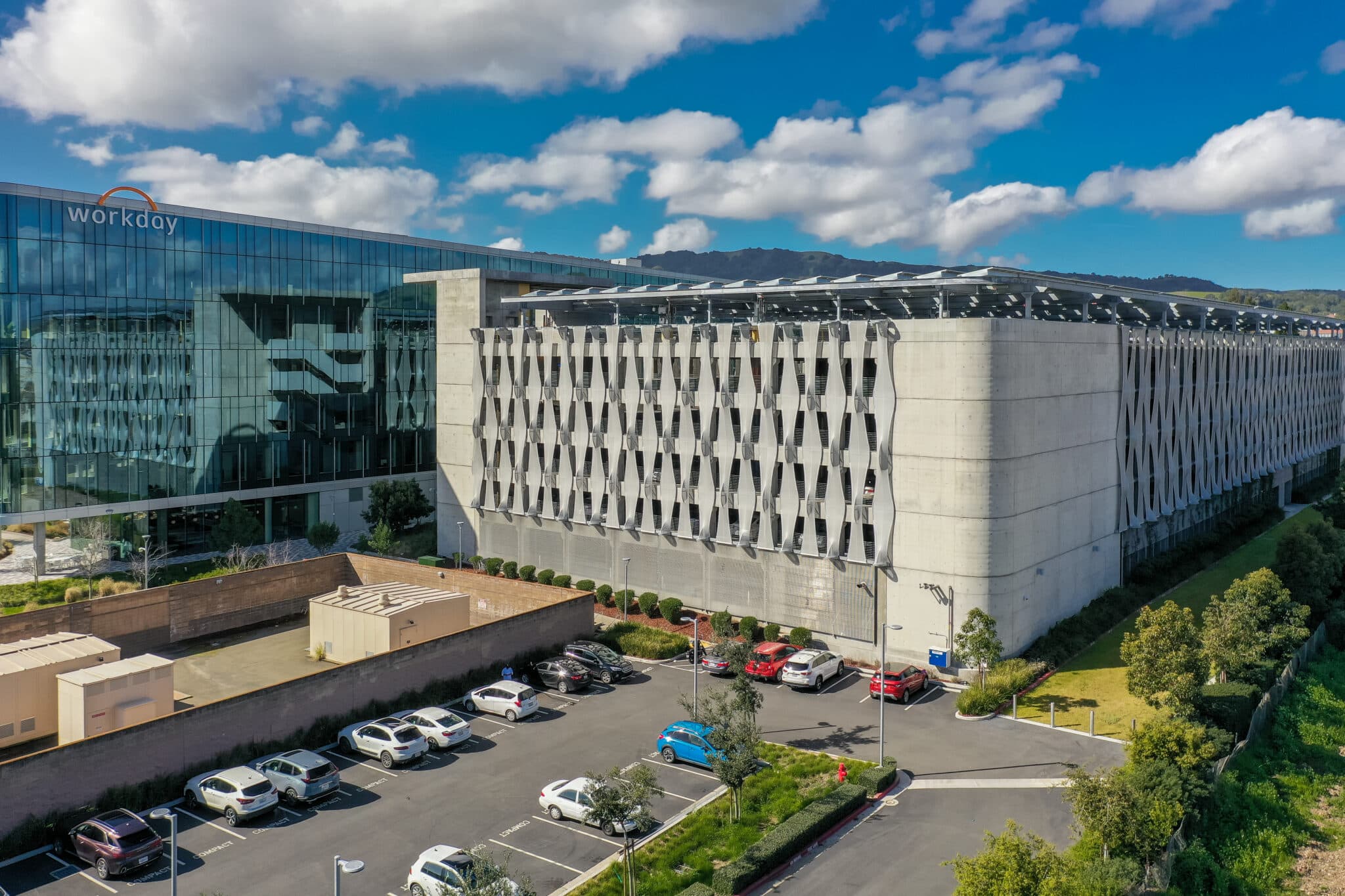 A woven like facade sat on a parking structure.