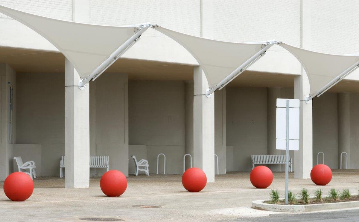 Three triangular winged canopy facades.