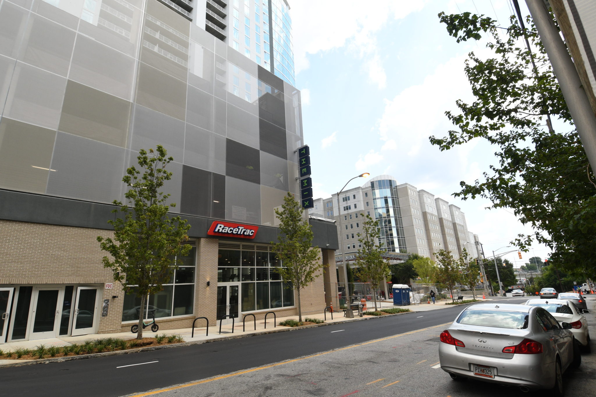 Monochromatic beige facade that is arranged in a checkered pattern.