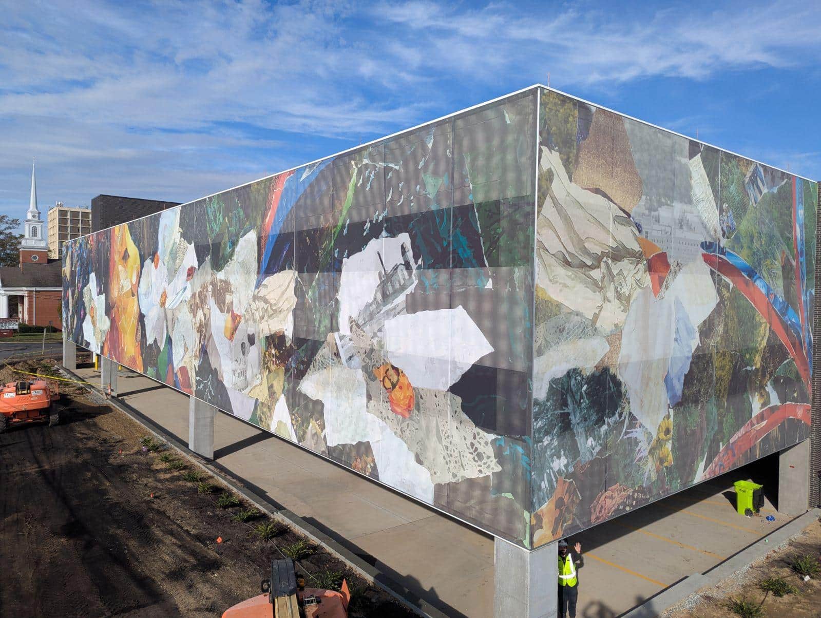 A graphic facade that has a mosaic floral motif.