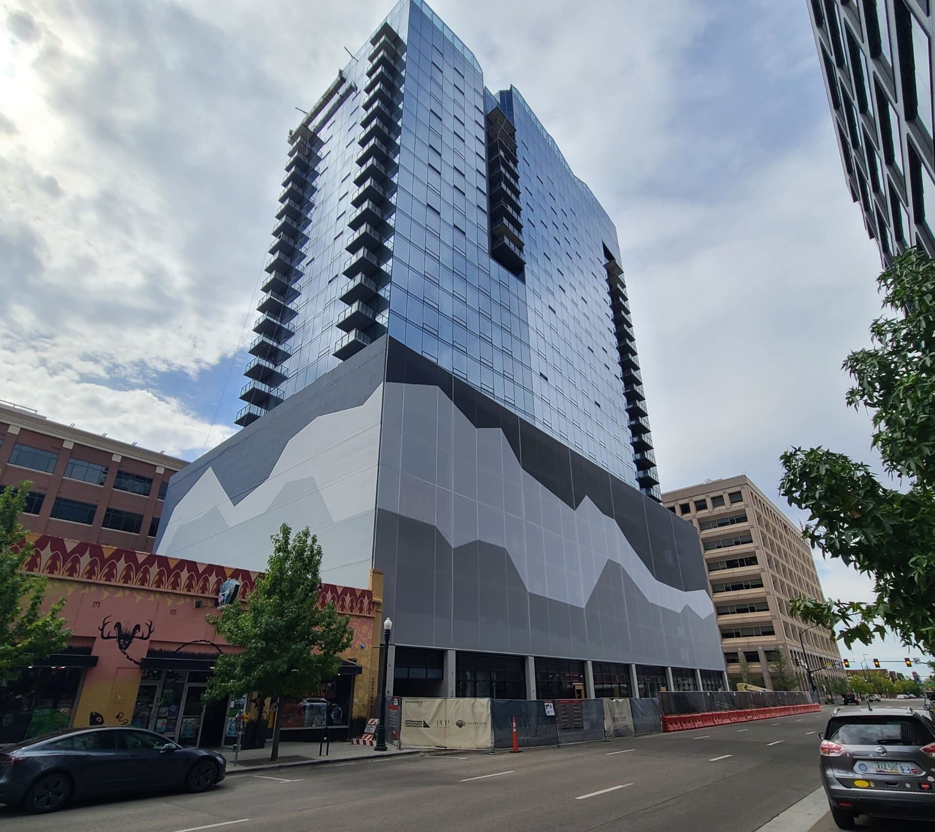 A corner shot of the abstract mountain facade showing the two longest sides.