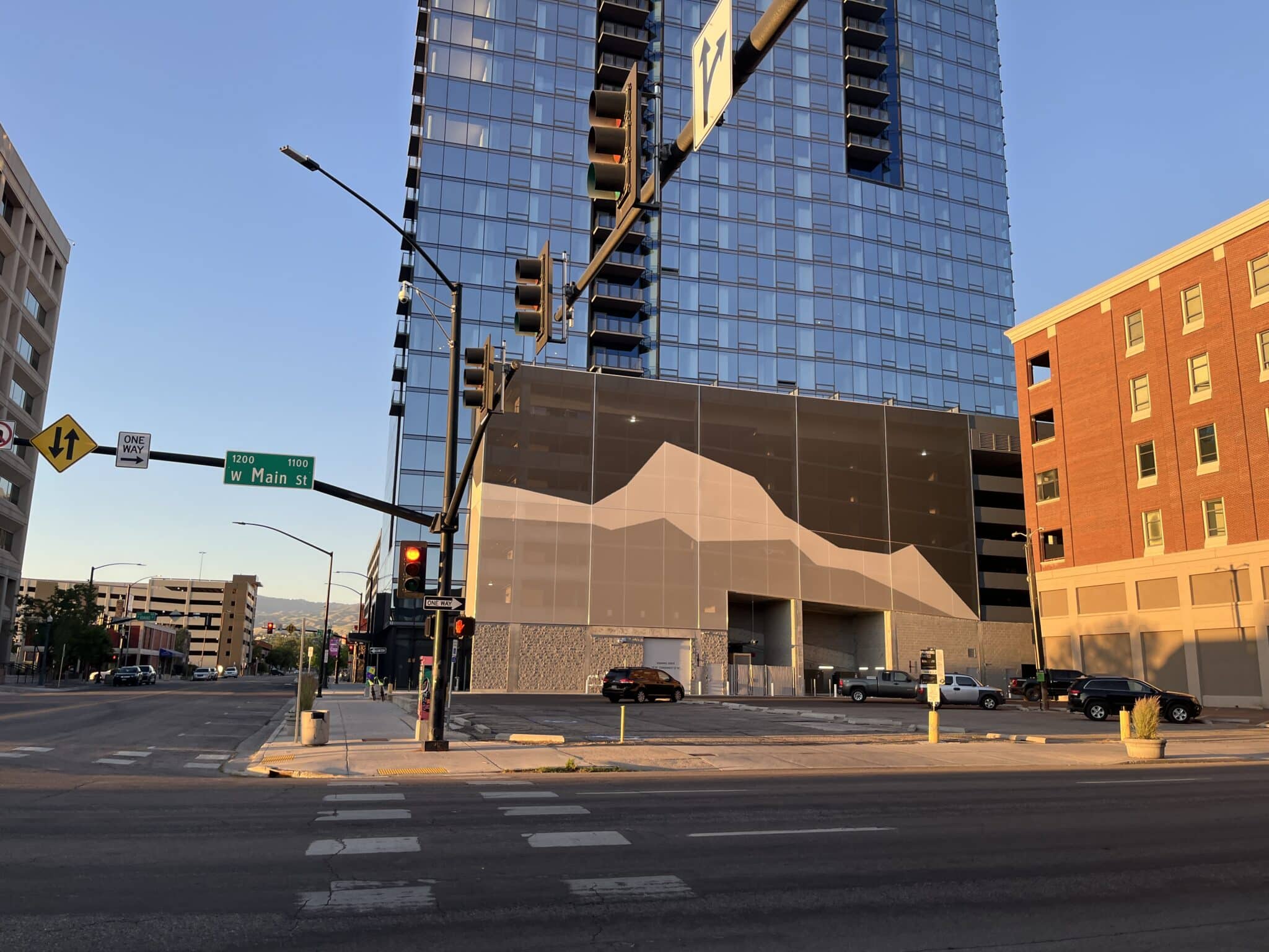 The tensile abstract mountain facade glowing in the sunset light.