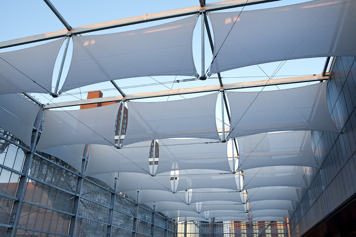 Multiple rows of stretch panel facades lined up in a row.