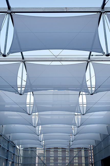 Multiple rows of stretch panel facades lined up in a row.