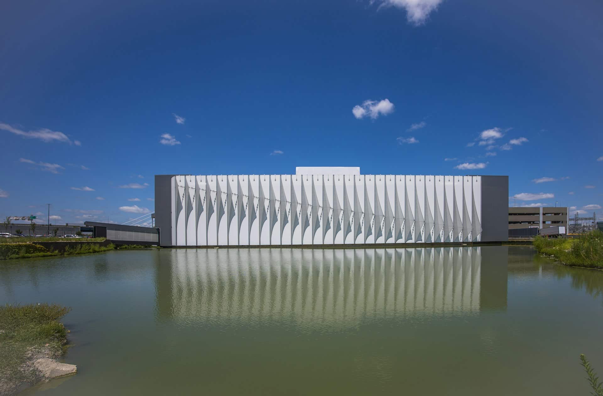 A profile view of the facade showing how the fins blend in and cast a diagonal shadow.
