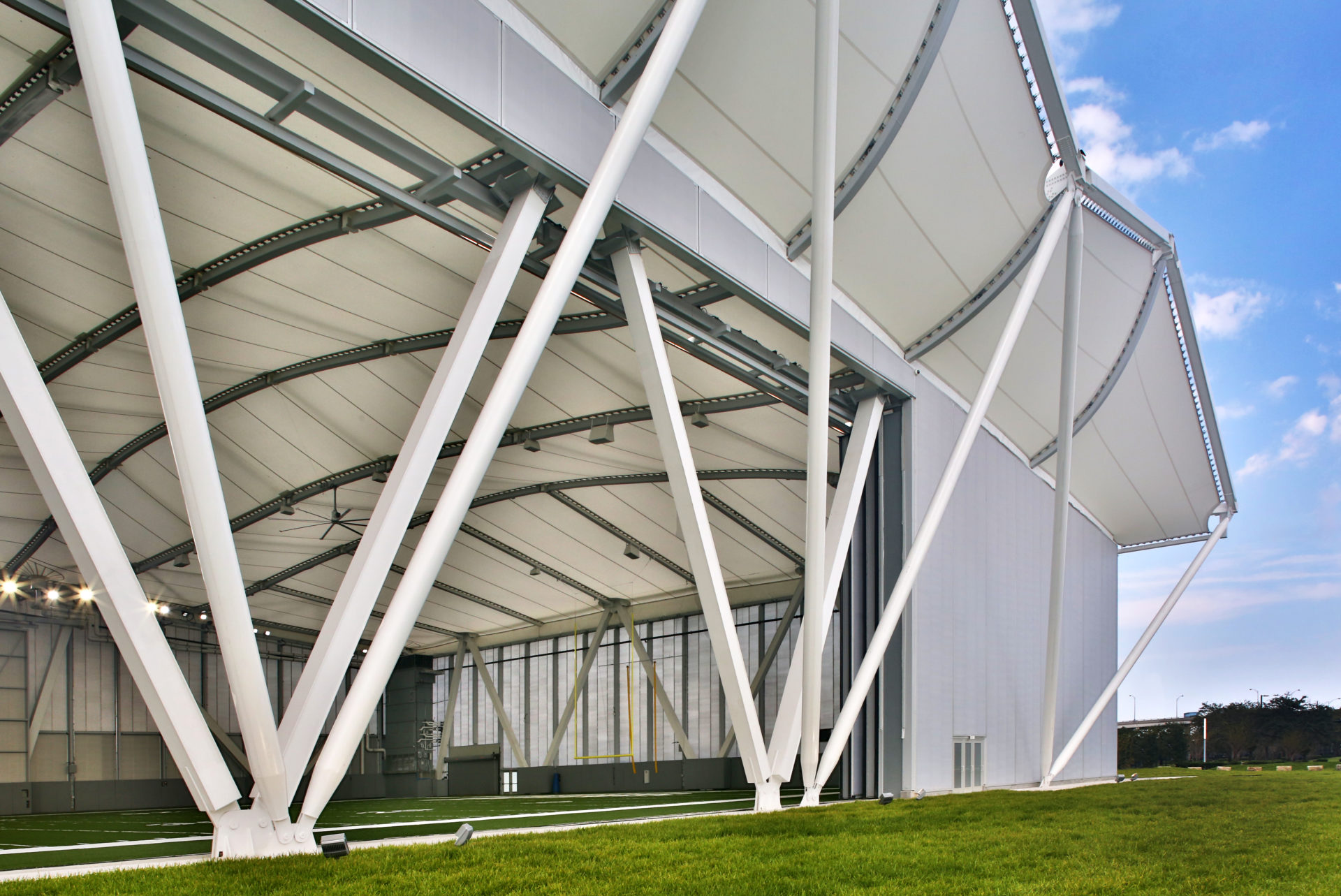 The facade from the exterior with the large door open.