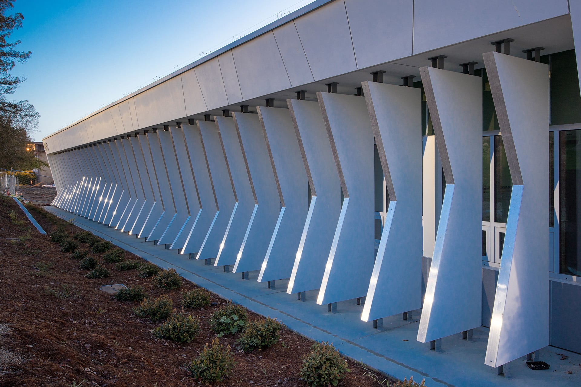 A full view of the facade that stretches across the building.