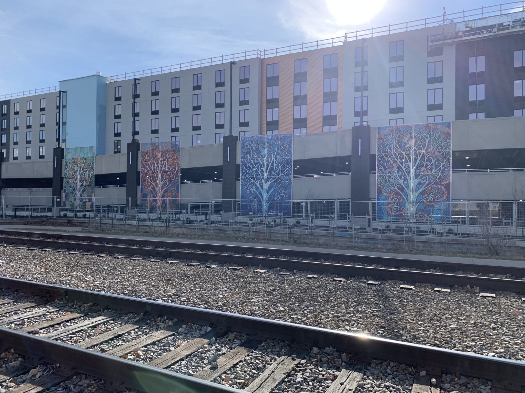 All four graphic facade panels in a row.