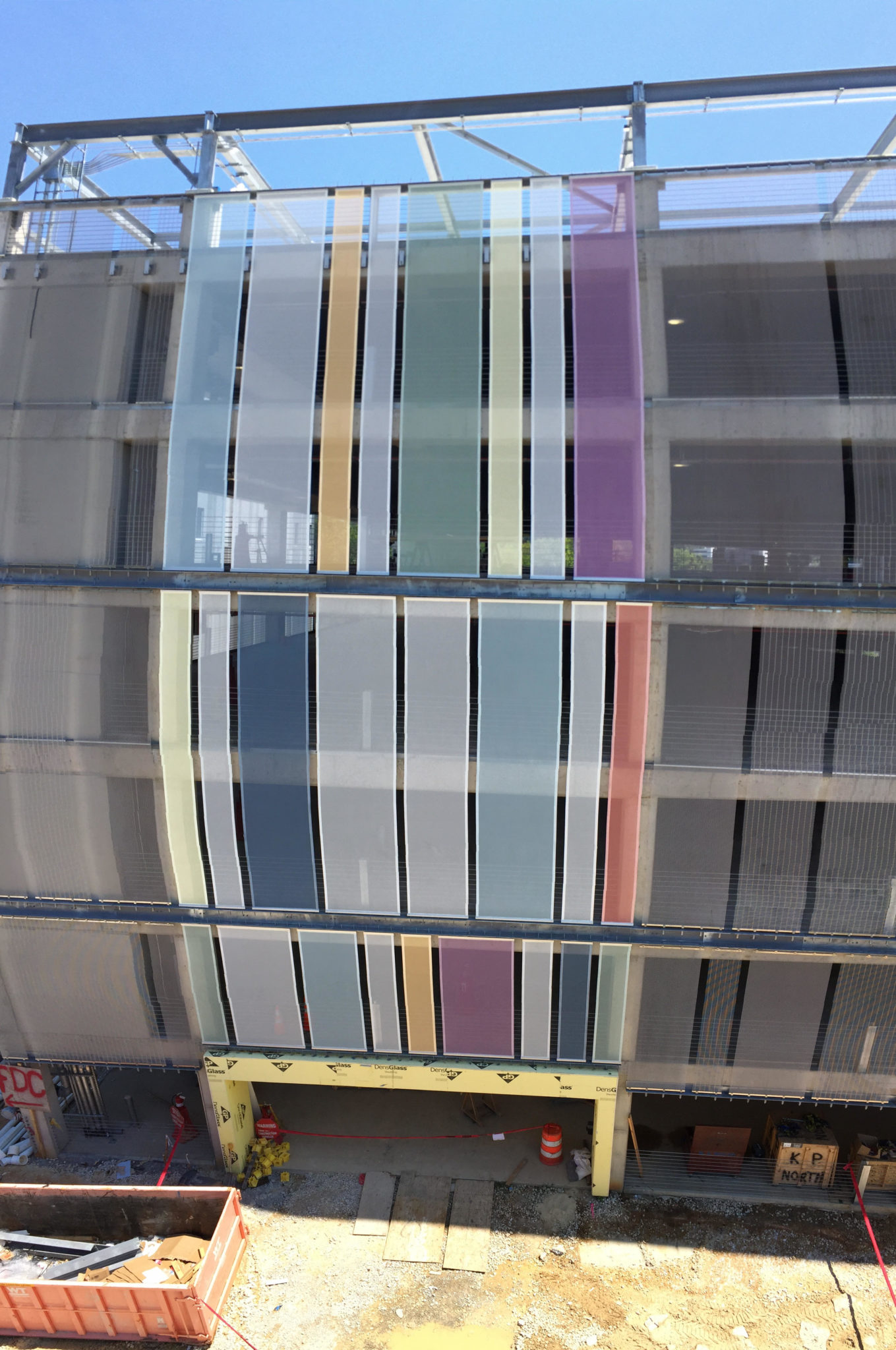 A fish-eye view of the colorful portion of the facade in its entirety.