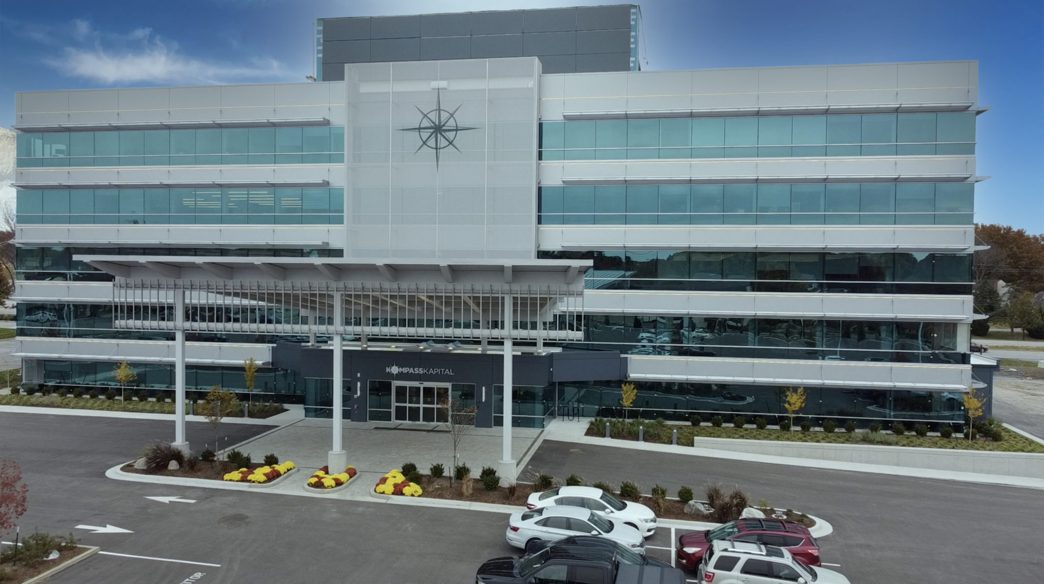 A wide view of the entire building, showing how the facades fits in context.