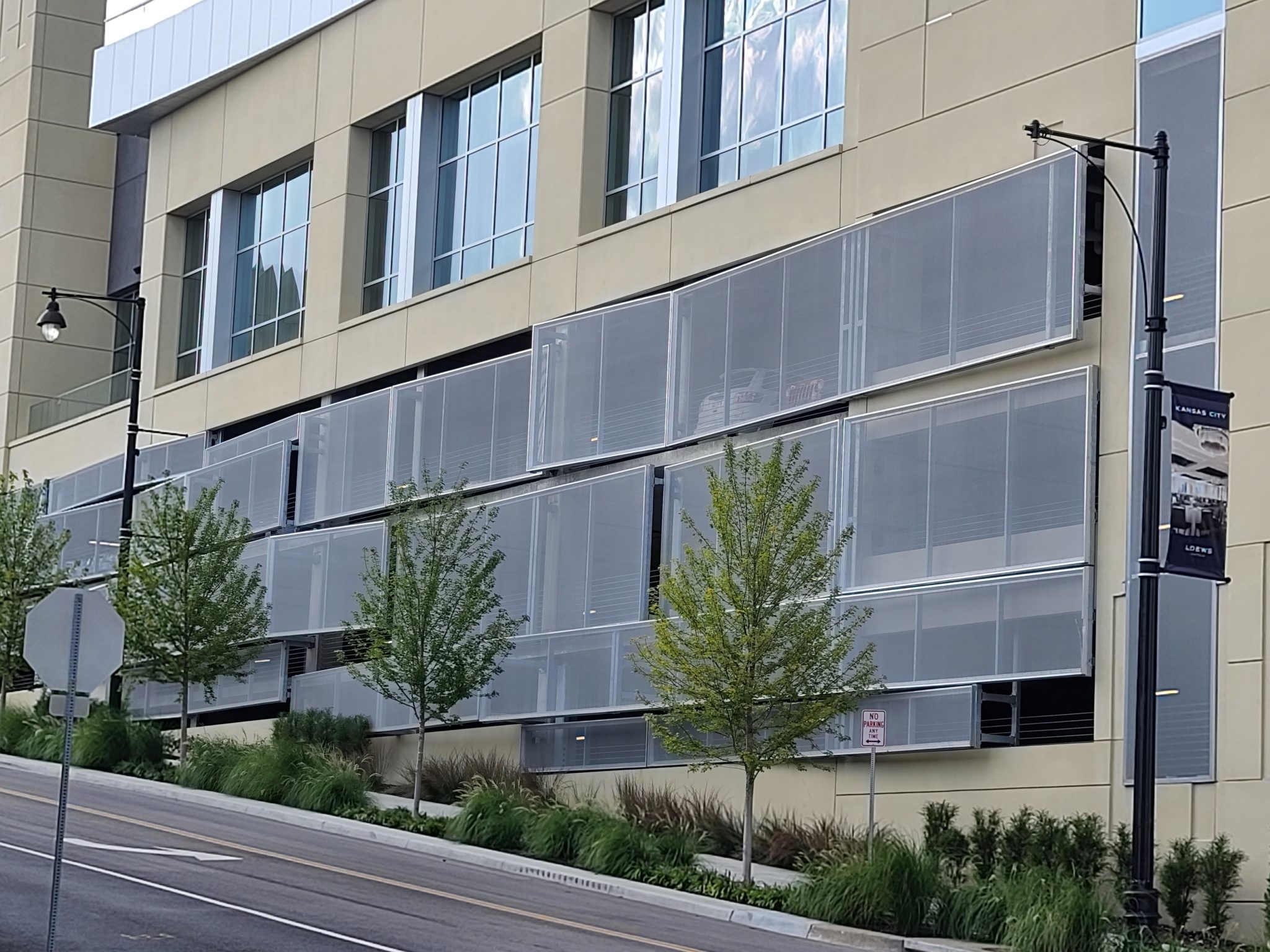 A closer view of the side of the facade that swoops out.