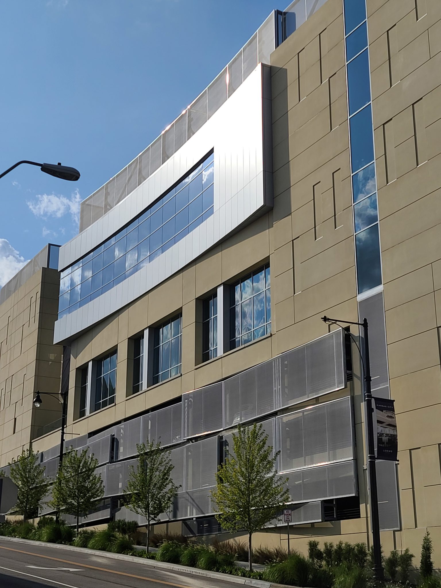 Another street view of the swooping side of the facade.