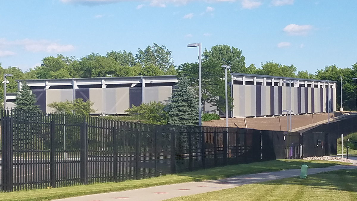 A zoomed in view of the facade from afar showing the colors and patterns.