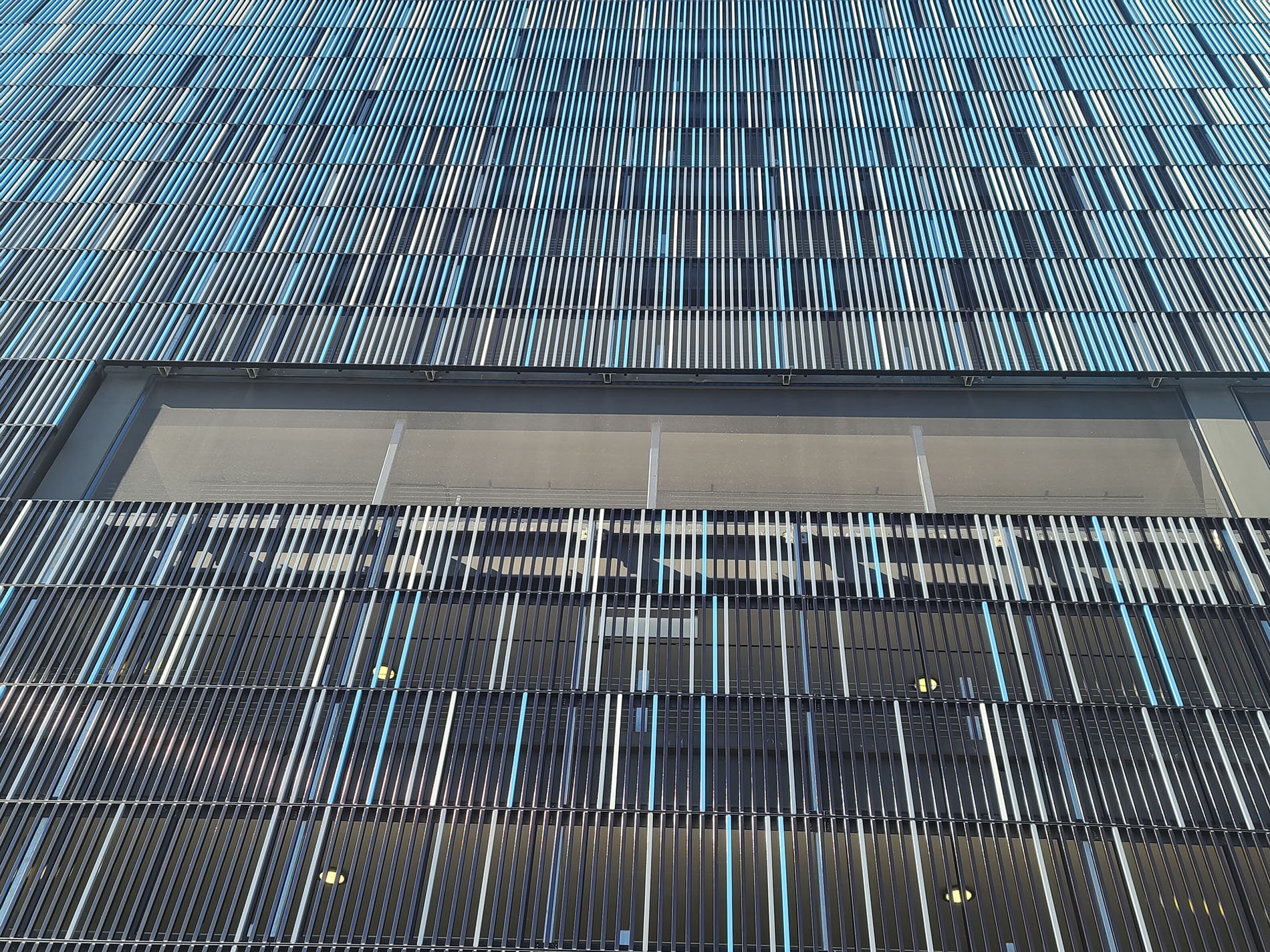 A close up of the facade panels showing the ventilation.