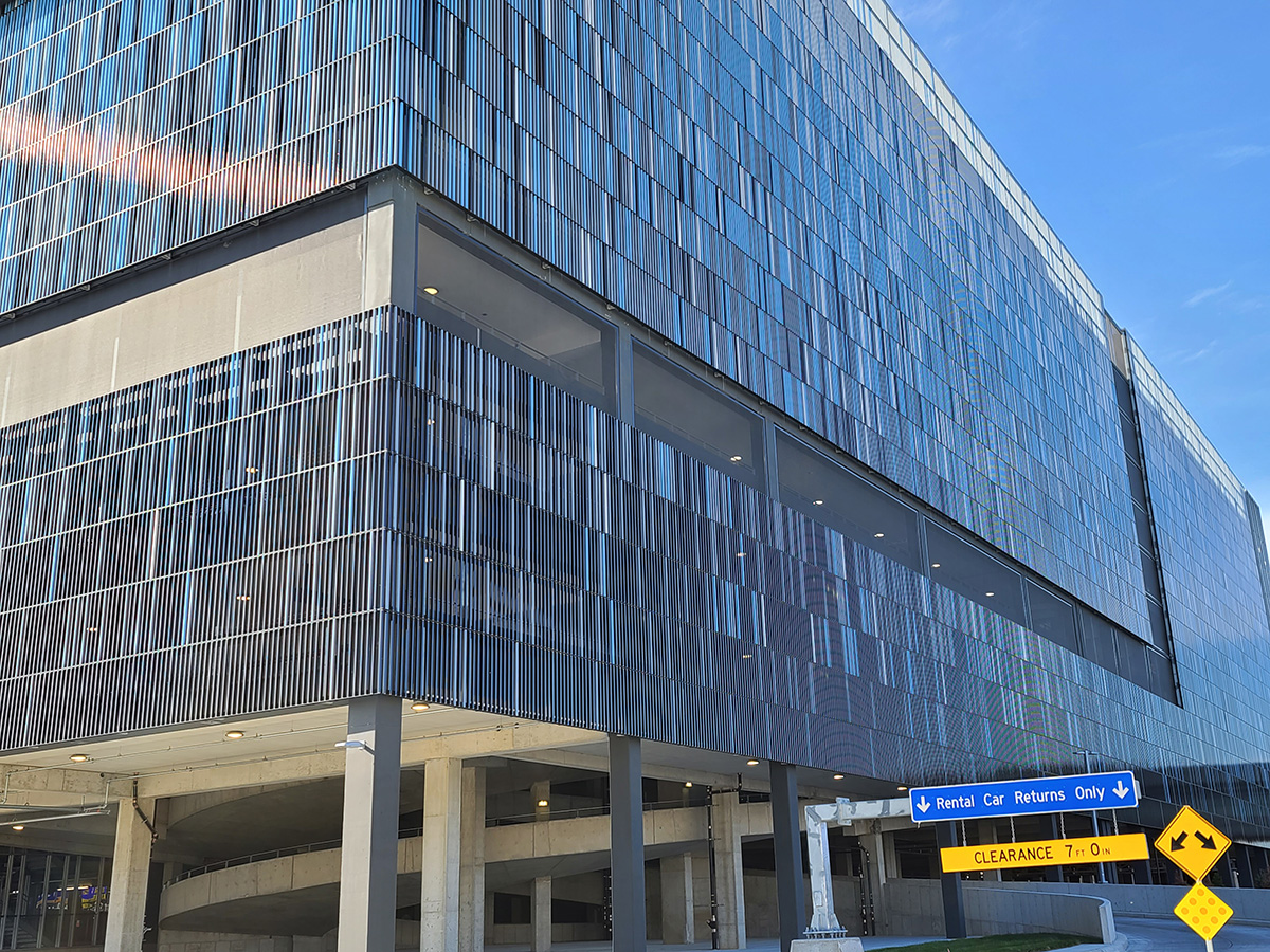 A view of the corner of the showing how the facade panels wraps around the corner.
