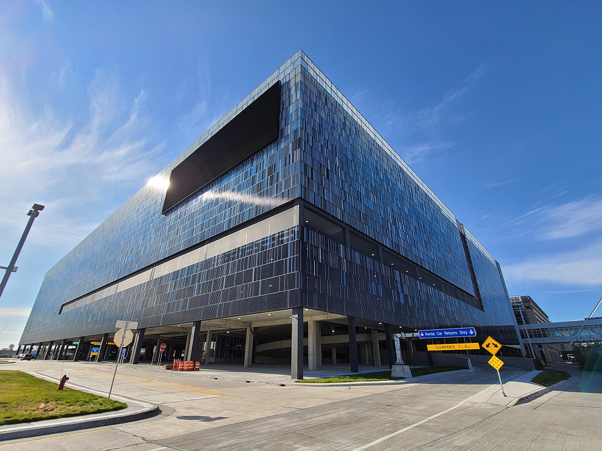A wide view of a different corner of the structure that shows a break in the facade.