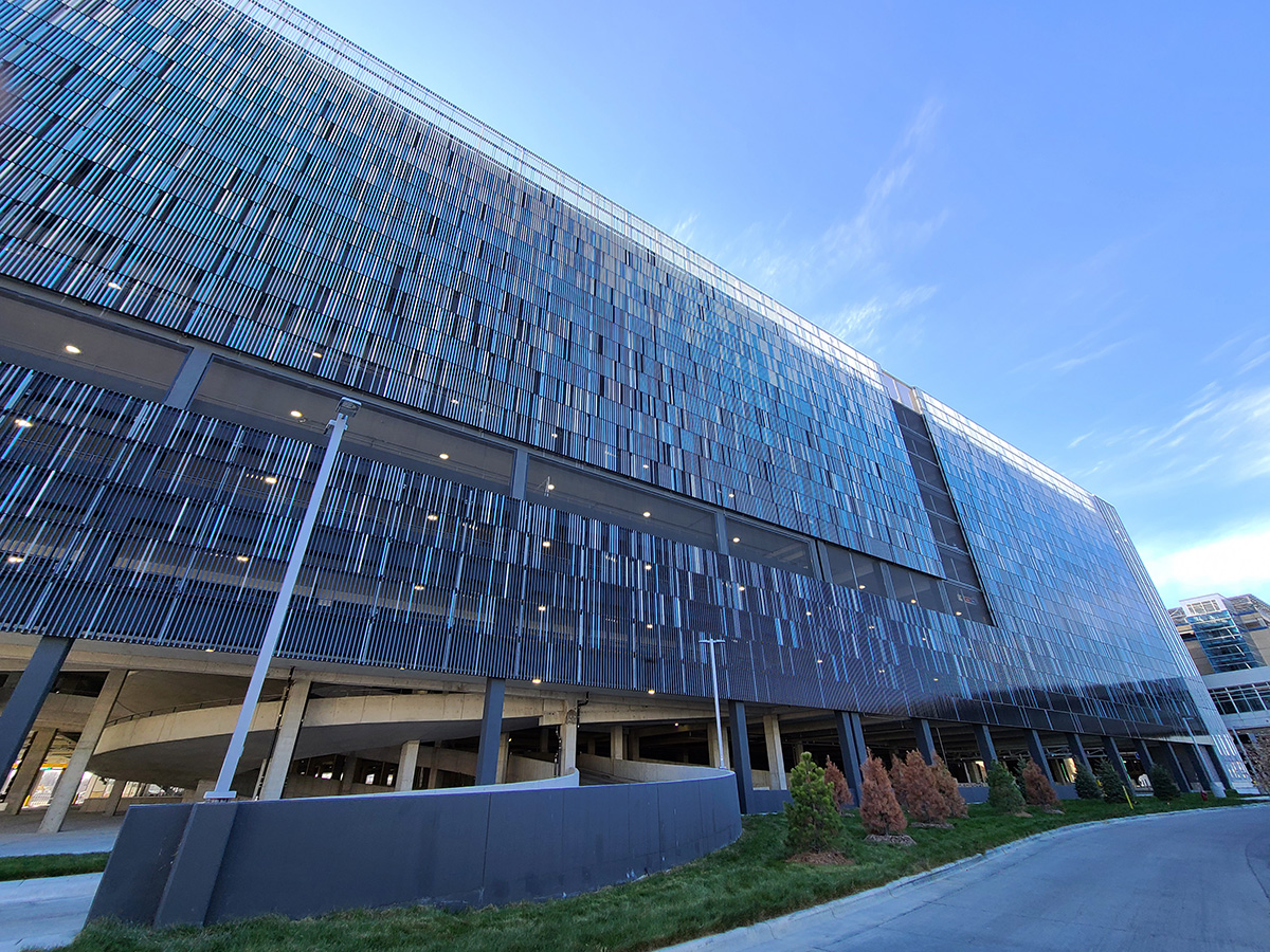 Another view of one of the sides of the facades that shows primarily light blue panels.