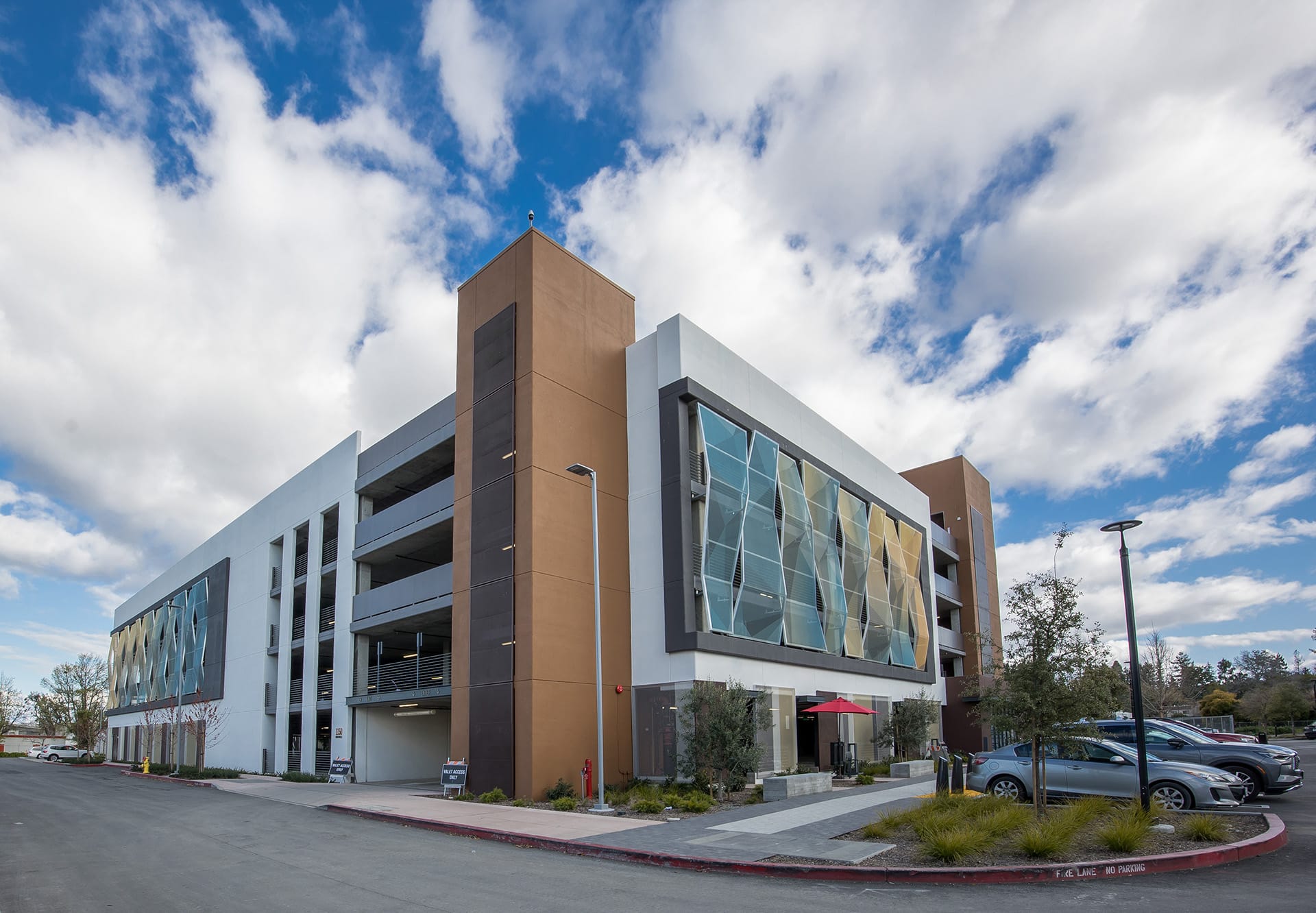 A wide view of the structure showing how the facade fits in with its surroundings.