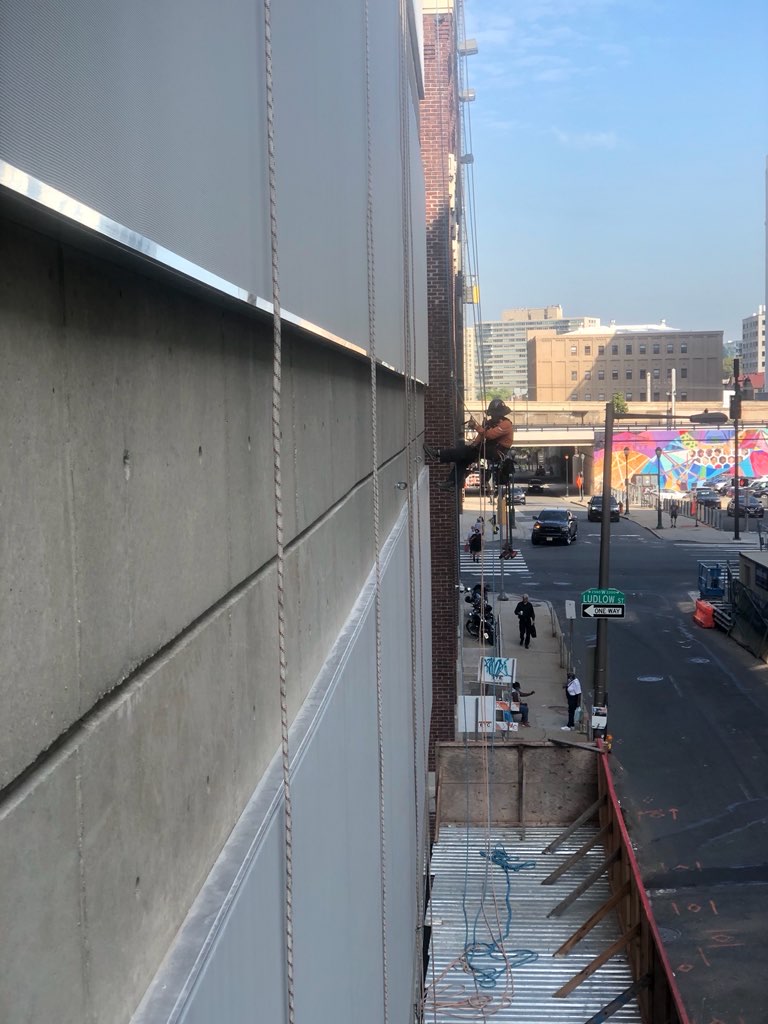 A close up of the facade on she wall showing the panel thickness.