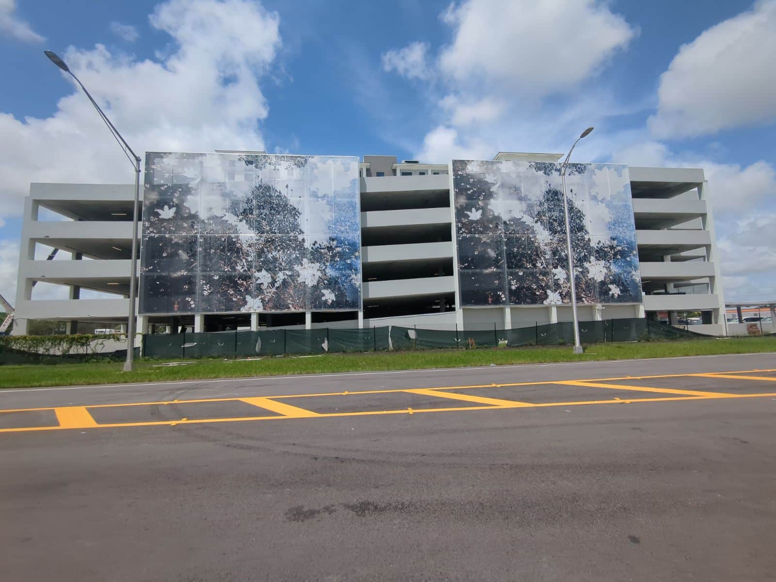 Two black and white floral motif facades.